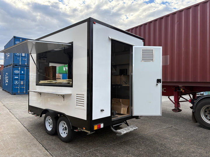 3m food trailer with open serving hatch and rear entry door